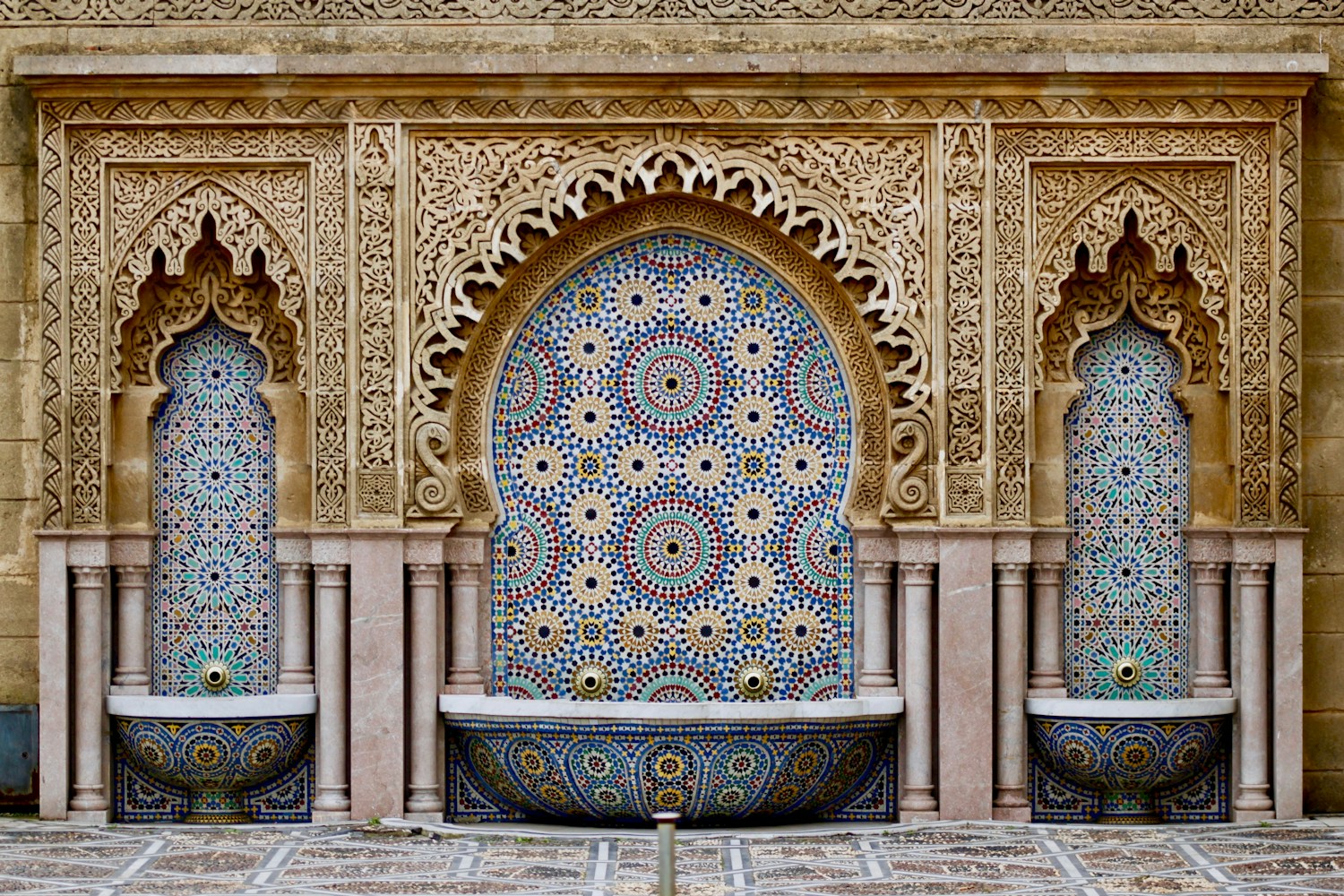 Traditional Moroccan courtyard with a tiled fountain